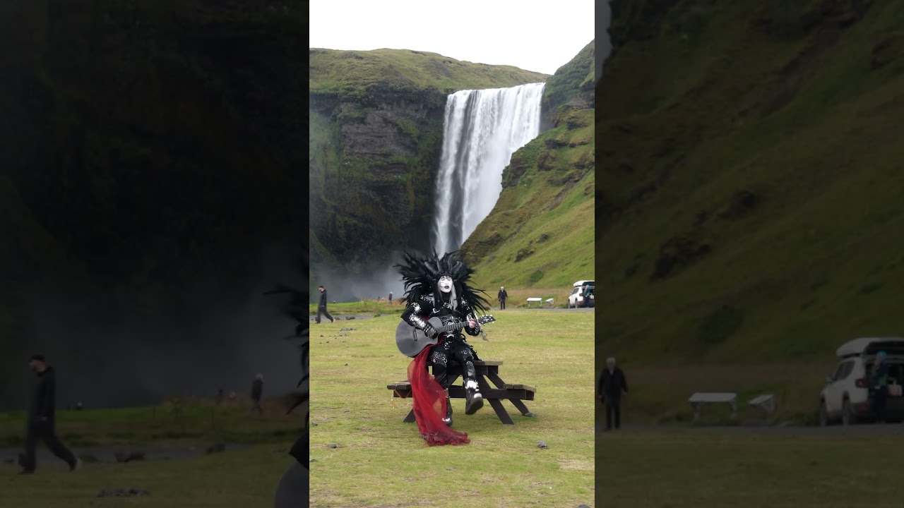 Mary on a cross at Scogafoss