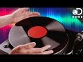 How is music stored on vinyl records