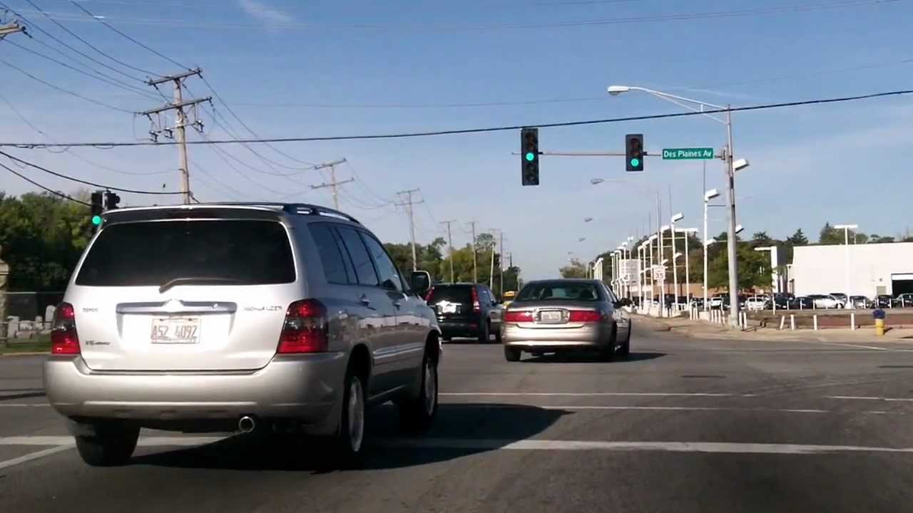 Idiot driver gets rear-ended stopping at a green light. - YouTube