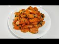 Carrots with garlic butter in a pan a very tasty and easy side dish