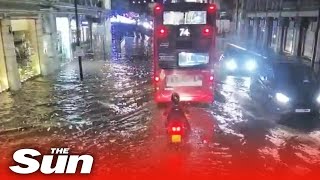 London streets FLOODED after an inch of rainfall in an HOUR