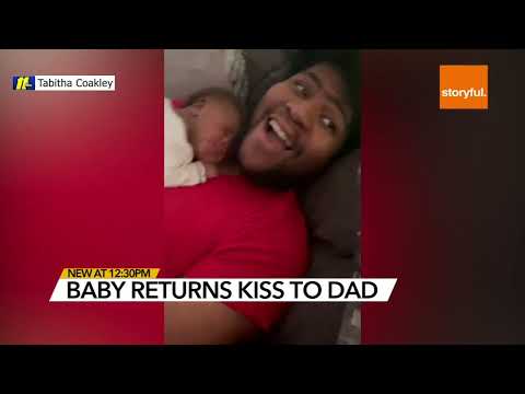 Newborn baby gives dad a kiss in adorable viral video