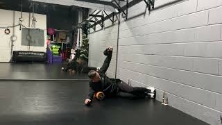 Side lying screwdriver with armpit on foam roller