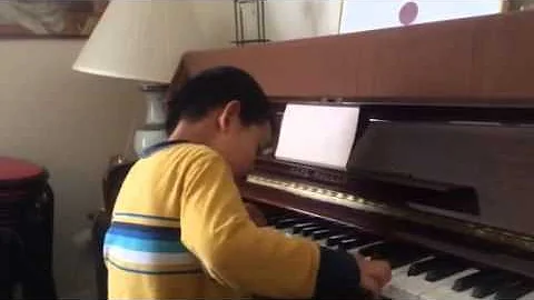 Anselm playing piano