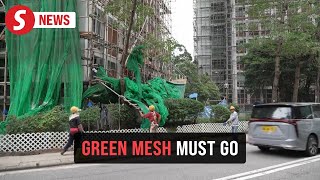 Hong Kong fire: Authorities rush to remove scaffolding nets from all buildings