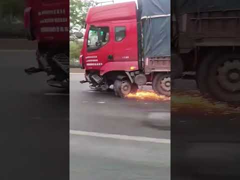 Truck with broken front wheel