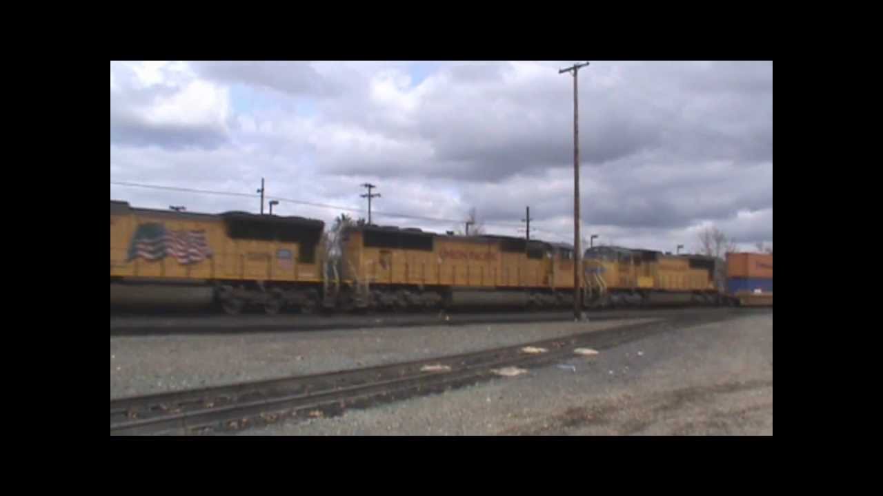 bnsf 5729 An SD70M Trio Leads a Stack Train through Roseville (2/11/12)