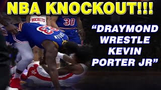 Draymond Green wrestle Kevin Porter Jr. to stop the play