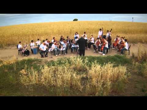 Himno Nacional Argentino en paisajes pampeanos con las orquestas infanto juvenil de La Pampa