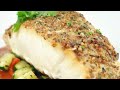 Baked corvina fish with mediterranean sauce