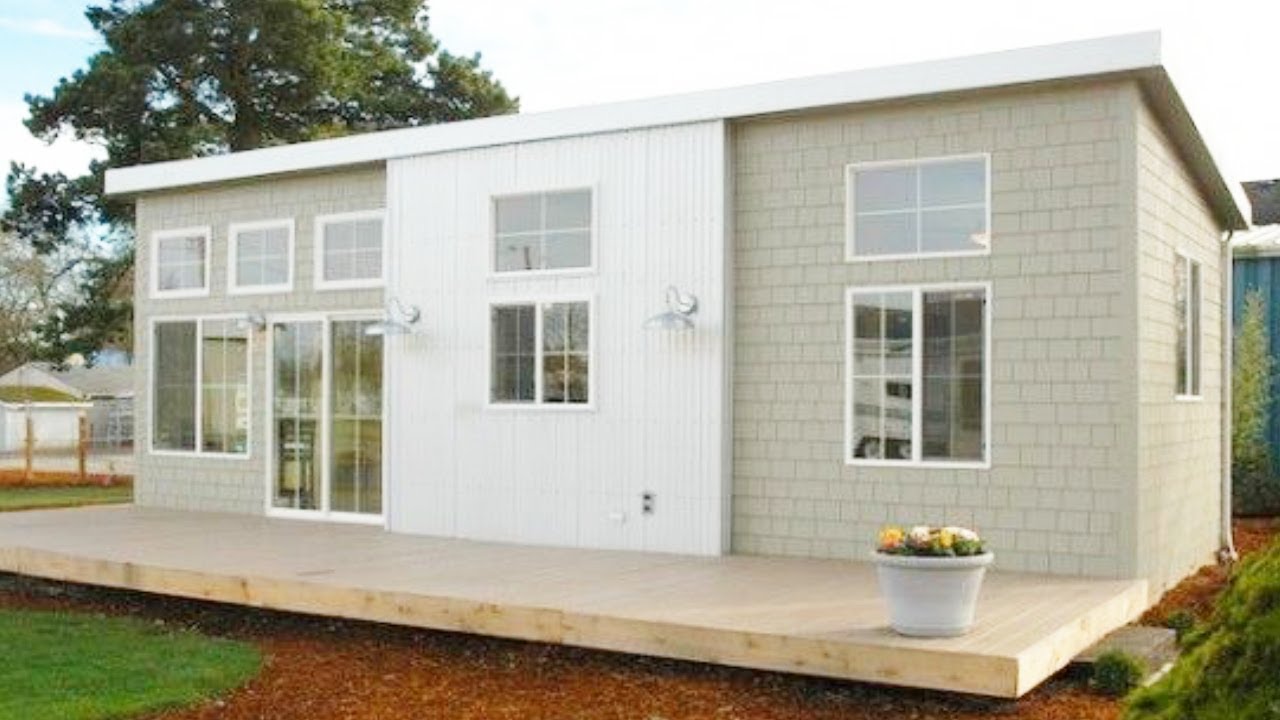 Абсолютно красивый 34-футовый маленький дом на колесах с двумя спальнями — дом мечты для пары.