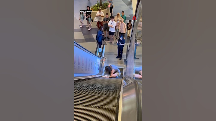 Girl's foot trapped in Singapore mall escalator