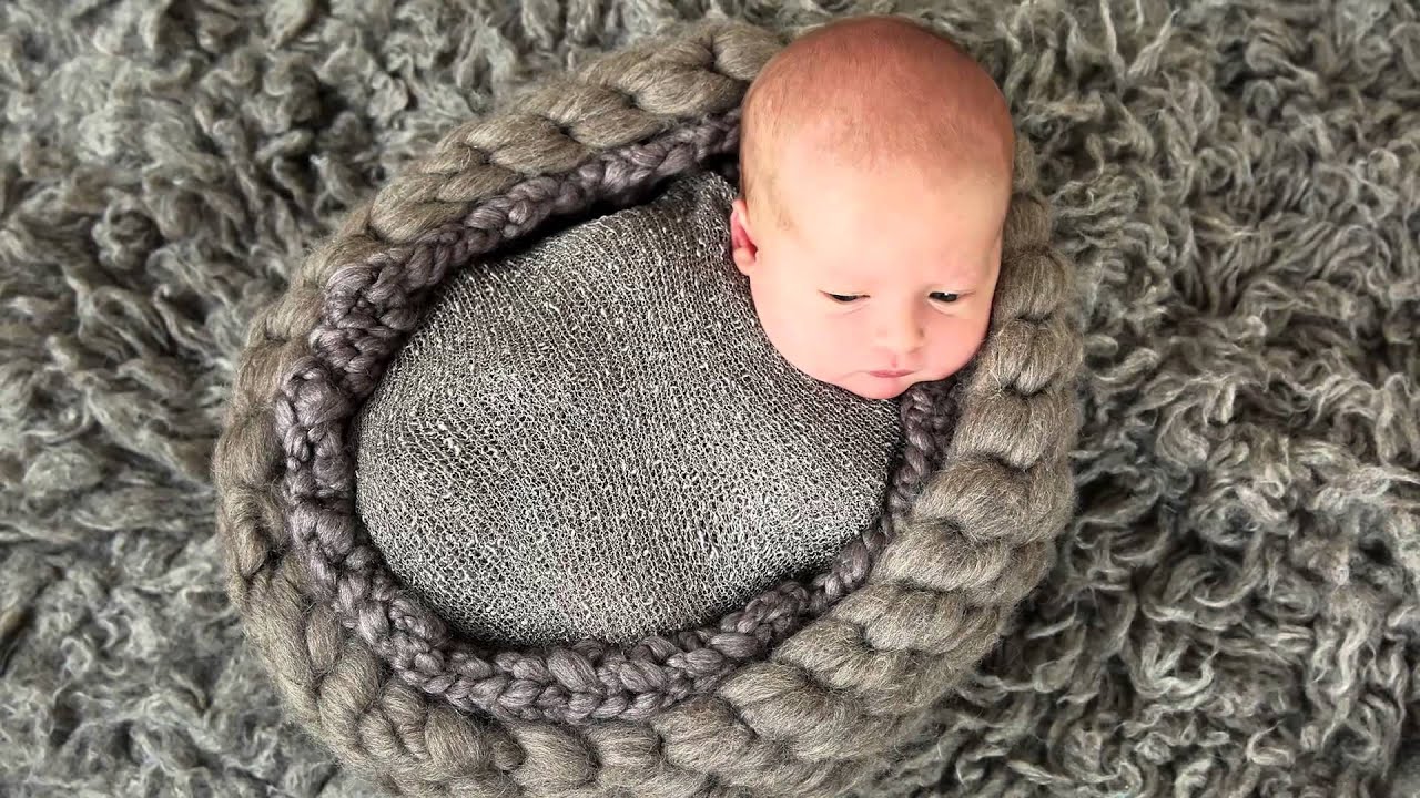 A Newborn Baby Boy and his Family photographed by Ana Brandt