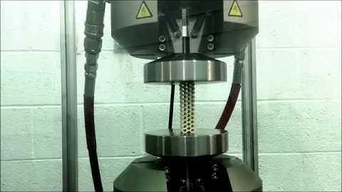 Compression Test of a 3D Printed Cellular Structure Showing Macrostructure Bending