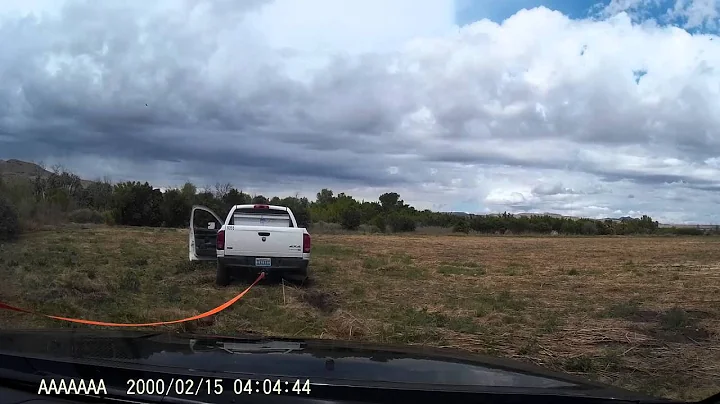 Pulling a Stuck Dodge Pickup Out of Mud