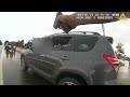 Bodycam: Officer Shoots Armed Woman, Almost Shoots Bystander.