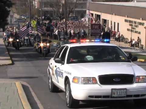 Scenes from the funeral service for Staff Sgt. Cha...