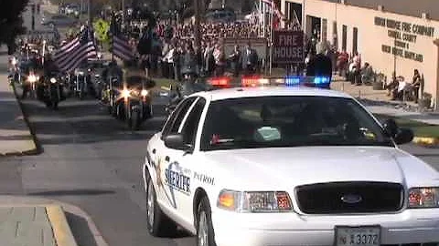 Scenes from the funeral service for Staff Sgt. Cha...