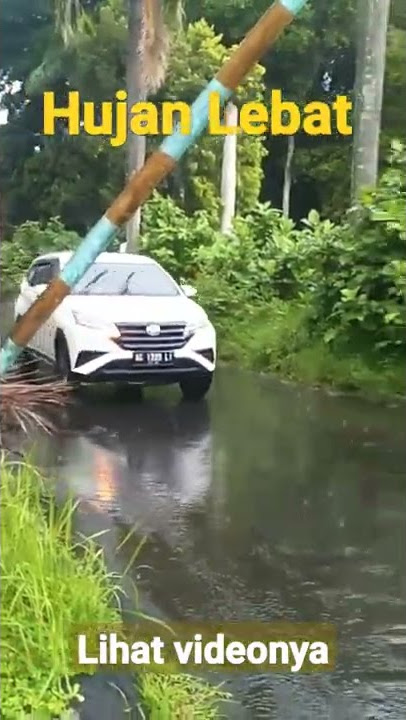 #Hujan Lebat Mobil Terios Melaju dengan Hati-hati