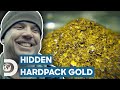 Chunky gold nuggets hidden inside hardpack  gold rush white water