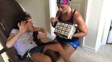 Angela and Mom having back and forth conversation using PODD and partner assisted scanning