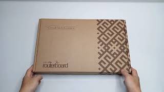 UNBOXING MikroTik CRS317-1G-16S RM by NeXTGENiT