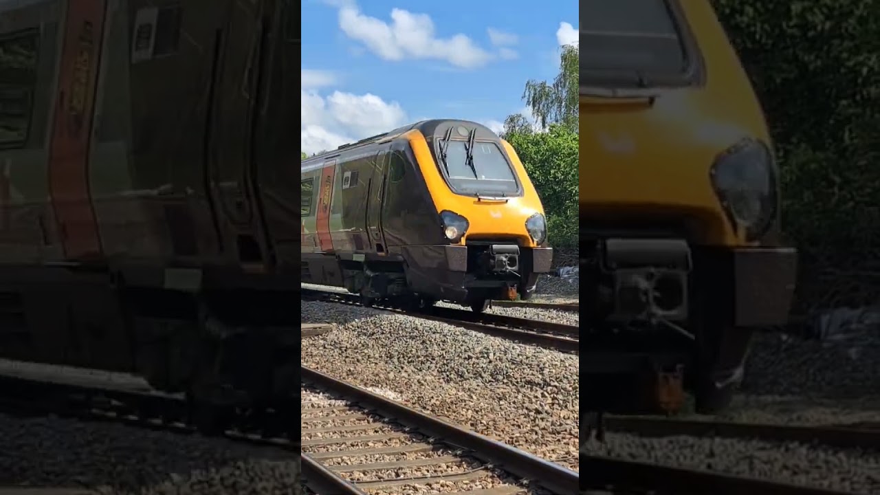 Cross Country Voyagers 221.119 & 220.001 passing Haresfield Foot Crossing.