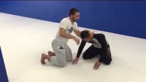 Club and dig to snap down to Schultz Headlock choke