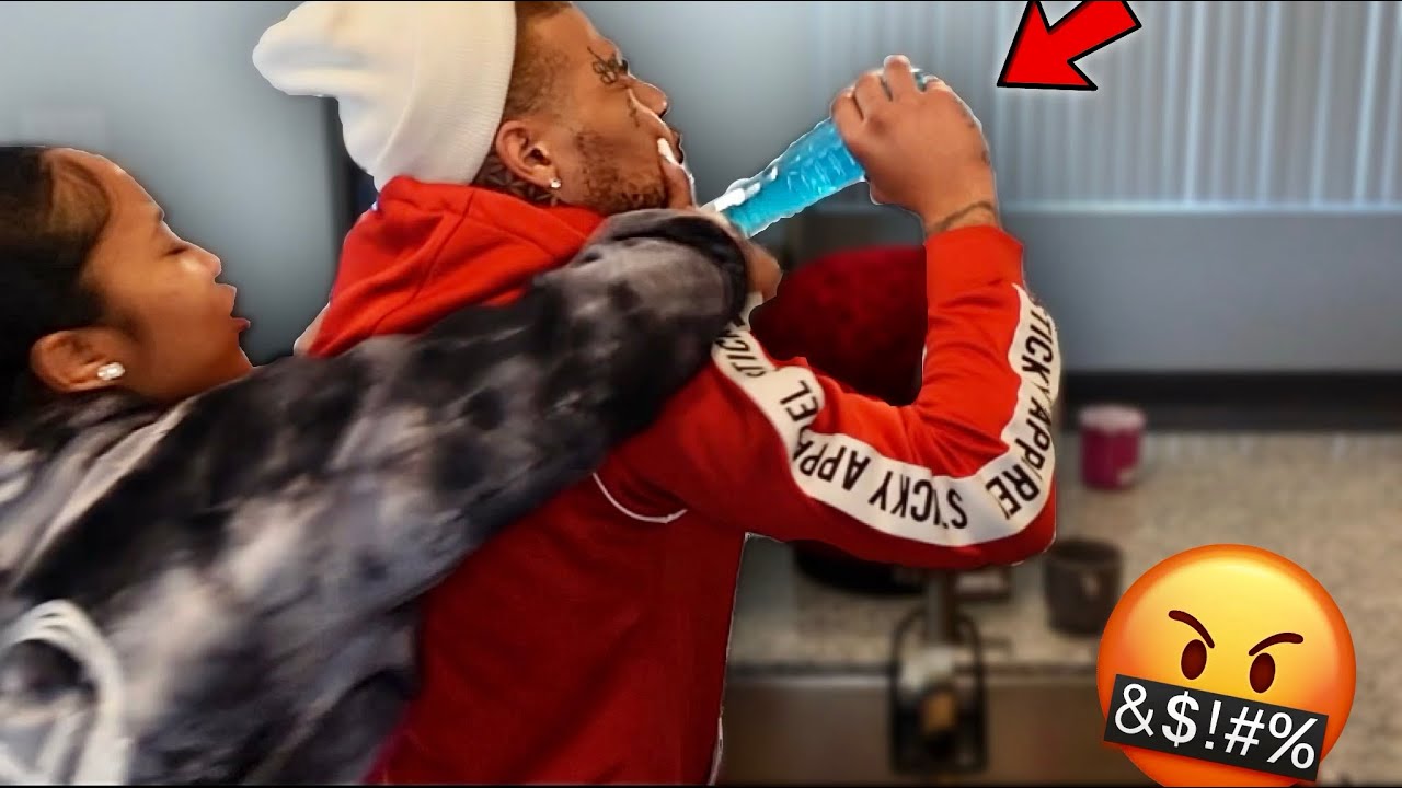 GATORADE IN WINDEX BOTTLE PRANK ON GIRLFRIEND!!! ** SHE FREAKS OUT**