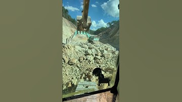 Excavators in Action: Efficient Collaboration for Moving Big Rocks!