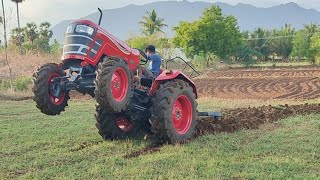 Mahindra yovo 585 tech Plus 4wd tractor goes to 5point cultivater pulling performance in farmland |