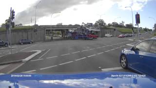 Aussie Truck Driver Loaded with Cars Hits the Overpass