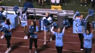 Stevenson alumni cheerleaders on sidelines with current SHS varsity cheerleaders