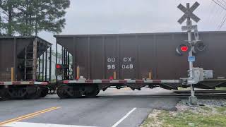 CSX 841 and CSX 254 lead a north bound empty coal train across Whitfield Street 7/28/2026