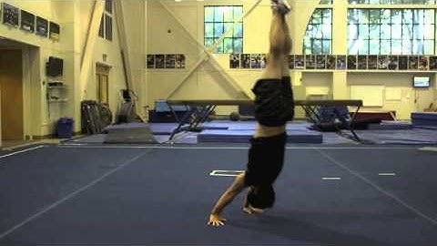 Forward Roll to Straddle Up to Handstand