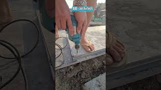 Manually Constructing Foundation Formwork Using Plywood And Box Steel.