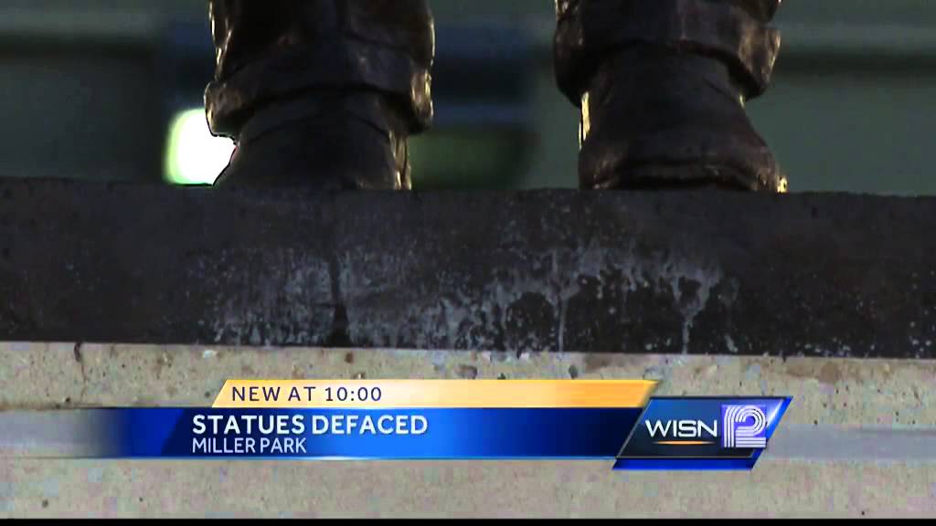 Woman throws paint on Miller Park statues