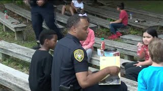UVA police officers volunteering at Albemarle elementary school
