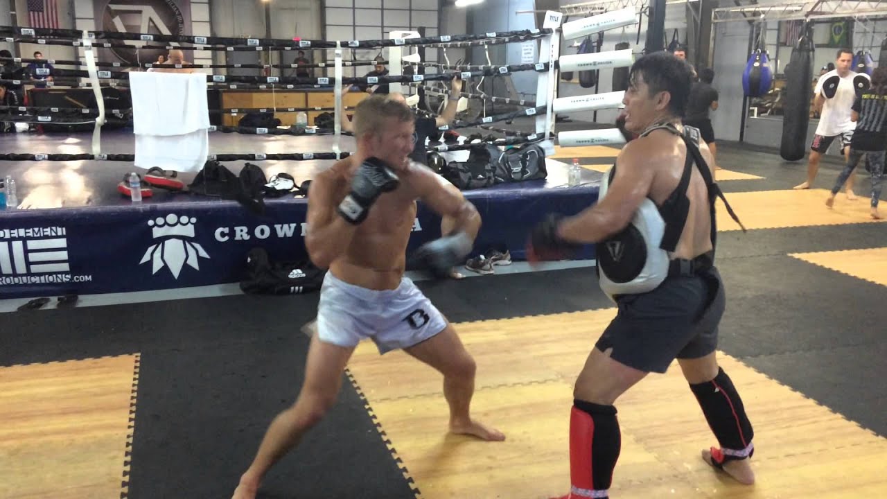 T.J. Dillashaw training with Master Thong before the fight