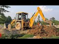 JCB Backhoe Making Drain in Village Road To Install Concrete Pipe - JCB Working in Road Construction