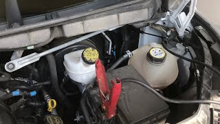 how to JUMPSTART or CHARGE a “ford transit 350” (hook up jumper cables or charger) not obvious