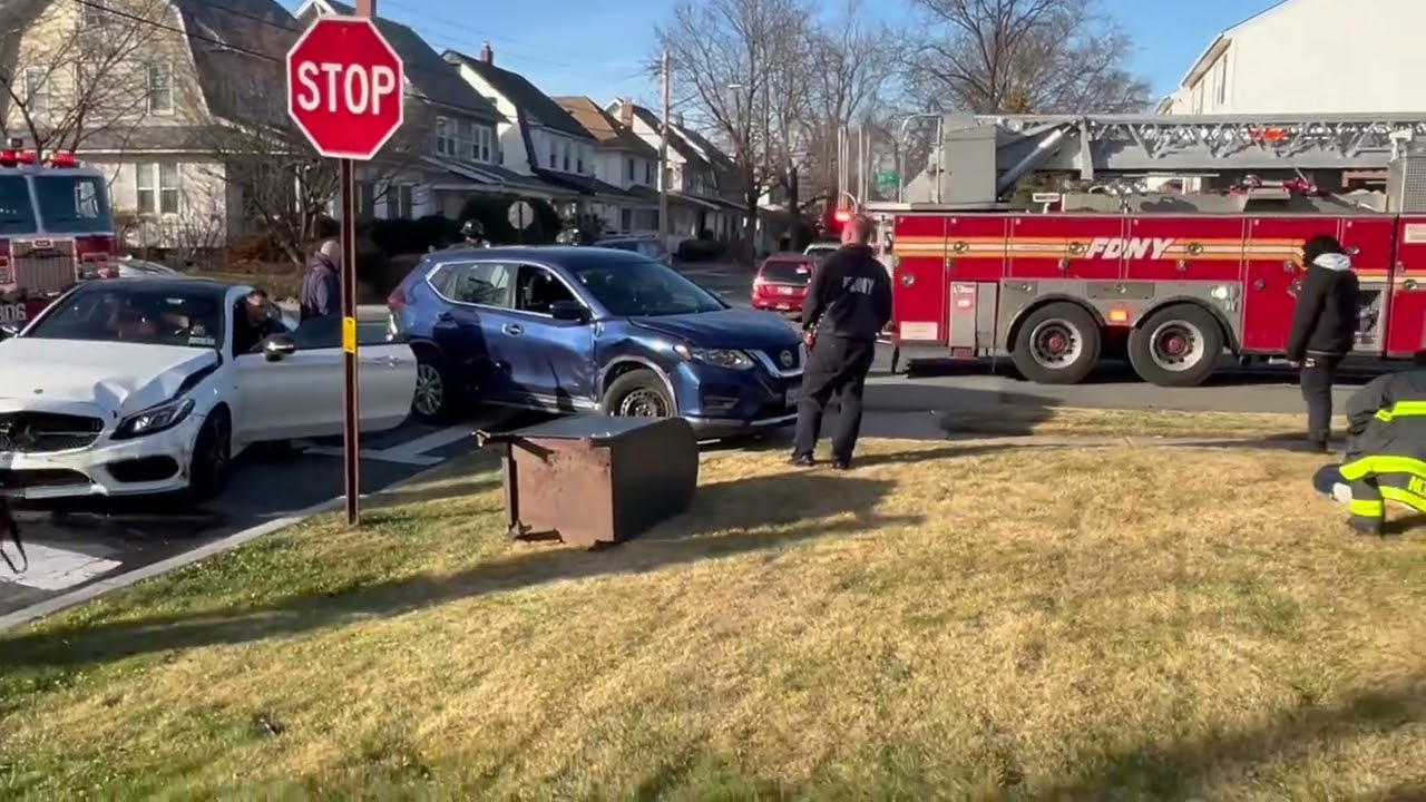 Two car crash w/ injury.FDNY E306,L167. Pd 111 sectors.