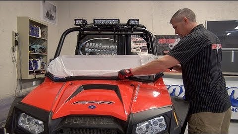 Installing the Pure Polaris Lock and Ride half windshield, Powermodz!