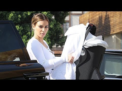 kim-kardashian-takes-baby-nori-shopping-for-home-goods-[2014]