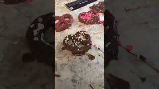 Making chocolate Covered pretzels￼