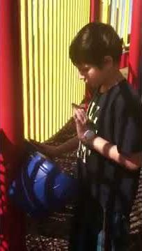 Addison making music at the playground!