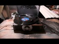 Destroying a vinyl record during playback