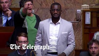 Moment far-right MP shouts 'go back to Africa' during French Parliament Resimi