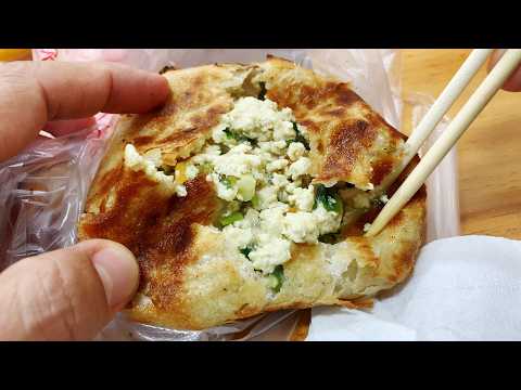 Cooking roasted and baked pies with tofu and meat fillings, yummy street food in China.