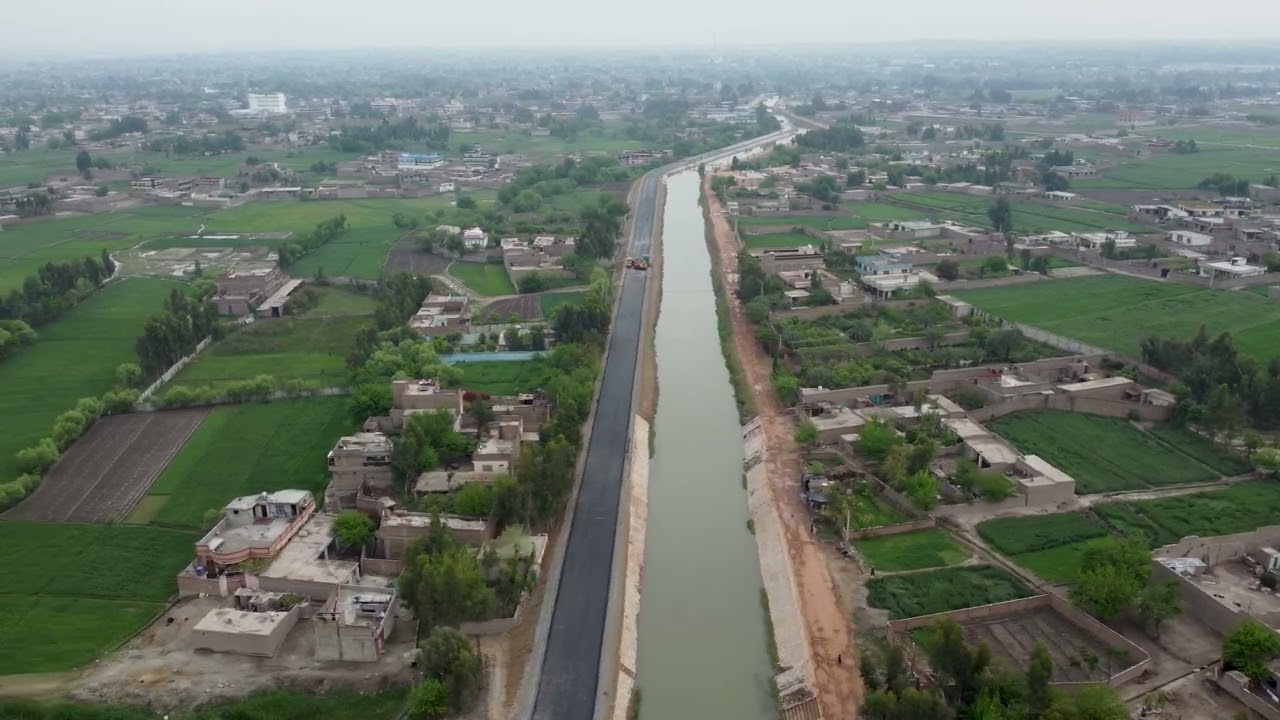 Aerial Shot For The River Nile Of Egypt In Cairo Surrounded By The Green farm 